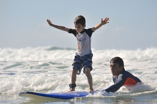 Arenas del Mar family surfing